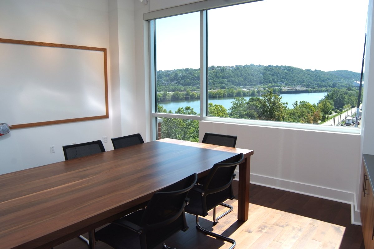 conference room, wood table, large window