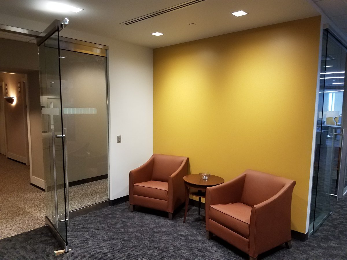 KPMG Entryway, two chairs, yellow walls