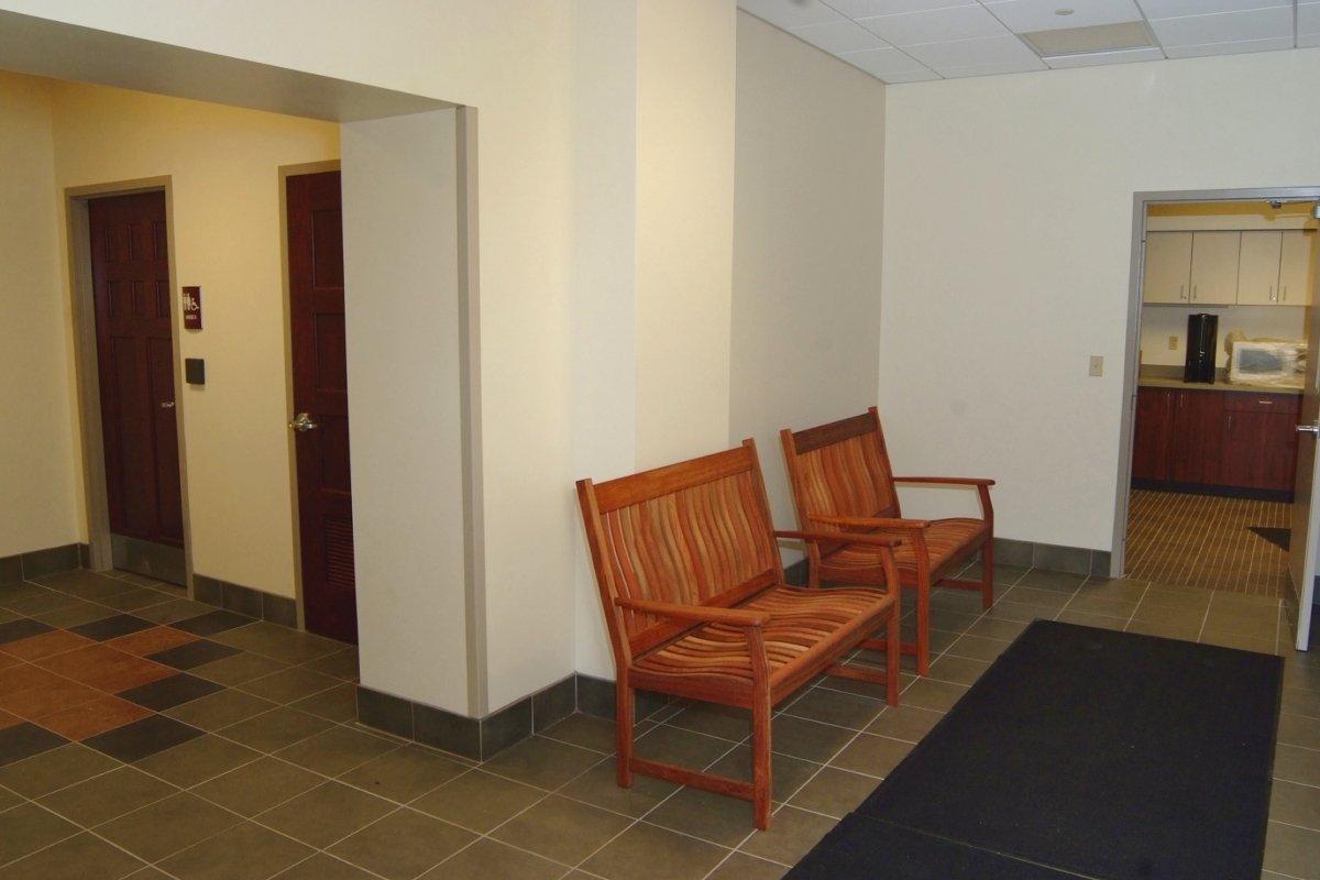 Restrooms and hallway with benches