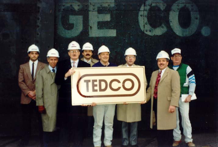 history-logoSign Group with first TEDCO logo sign