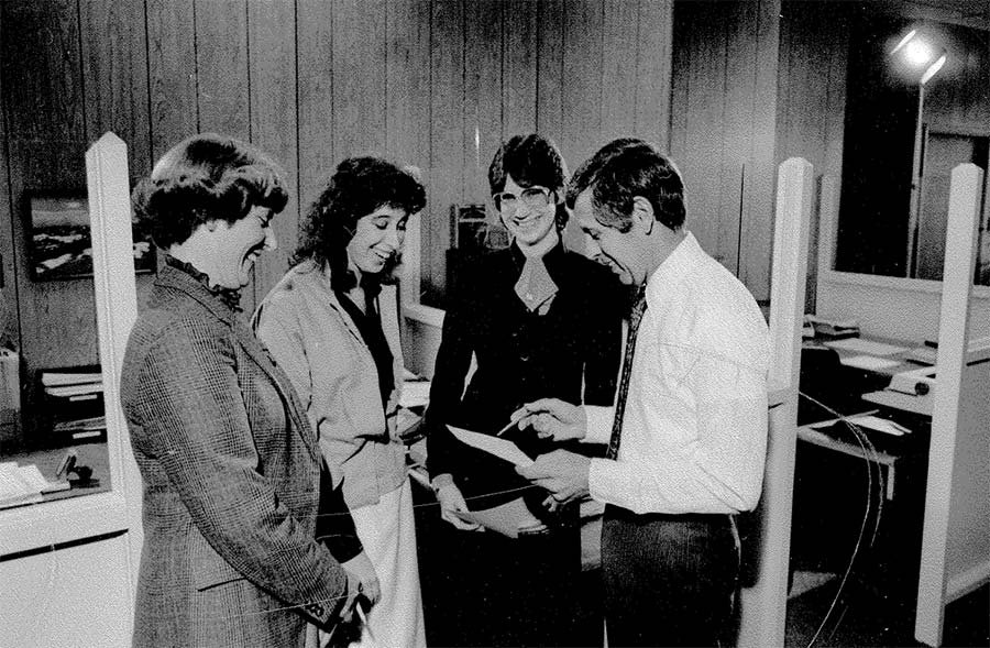 history-officeGroup Barbara and Ted Frantz with employees