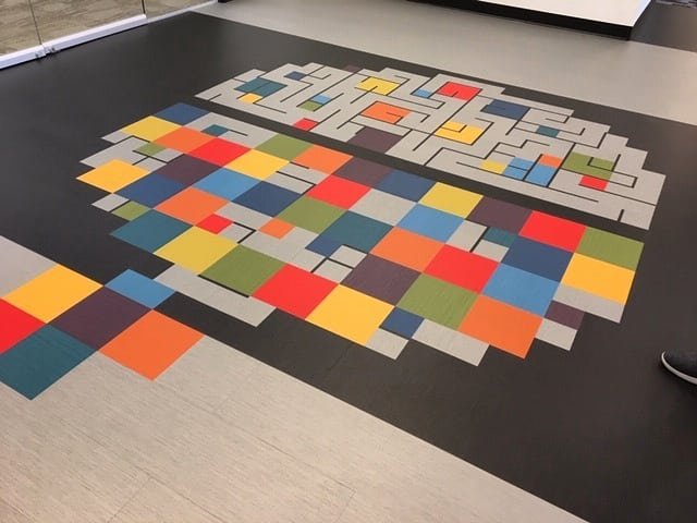 custom artwork continues to the entryway floor